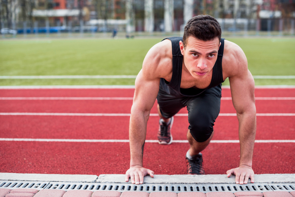 Athlete jumping onto plyometric box